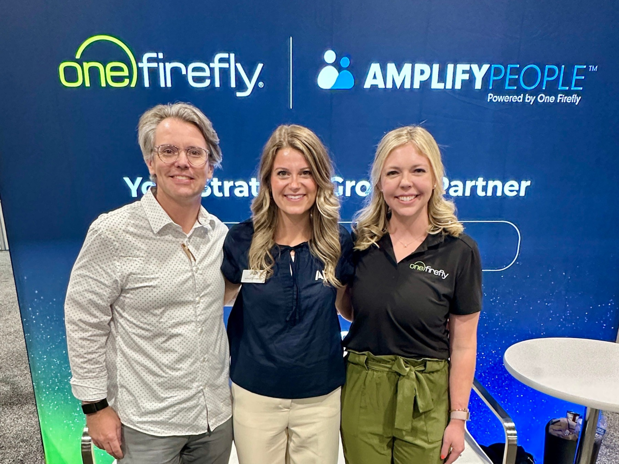 One Firefly and Amplify People team members at the CEDIA 2026 booth