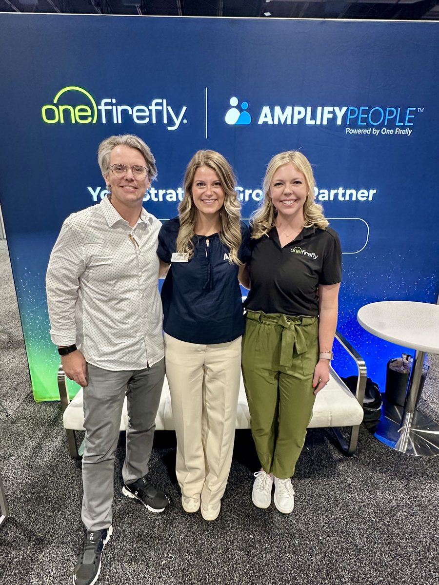 One Firefly and Amplify People team members at the CEDIA 2026 booth