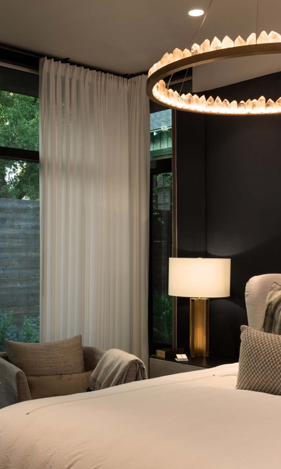 Front area of a house with lighted stairs and patio